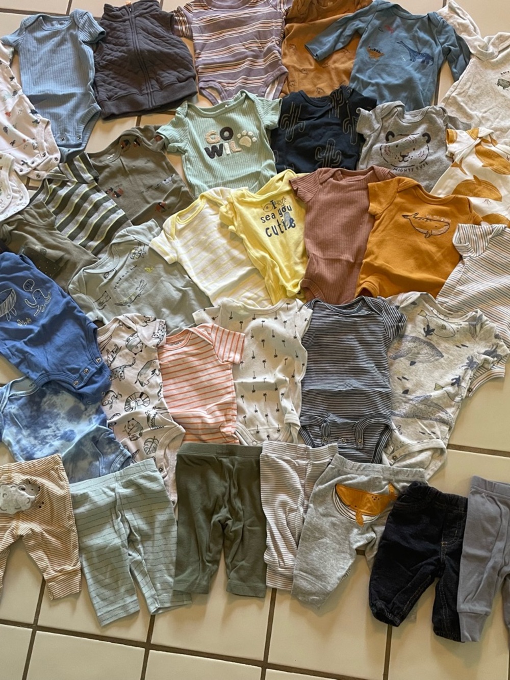 Assortments of 3 month old baby boy bodysuits and pants - short and long sleeve